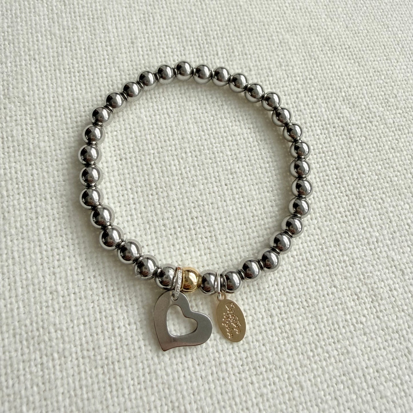 Bracelet en argent et cœur en argent
