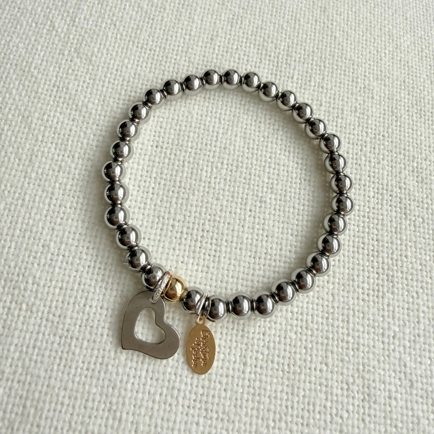 Bracelet en argent et cœur en argent